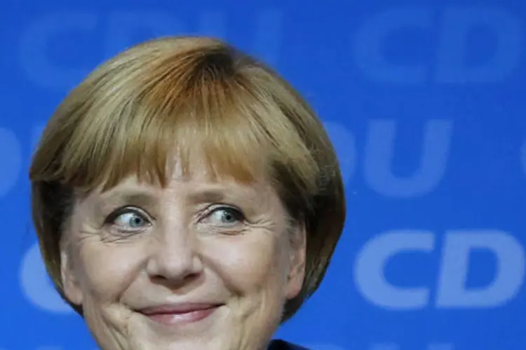Angela Merkel, chanceler alemã: o jornal "The New York Times", por exemplo, qualificou os resultados de "assombroso triunfo pessoal" para Merkel (Fabrizio Bensch/Reuters)