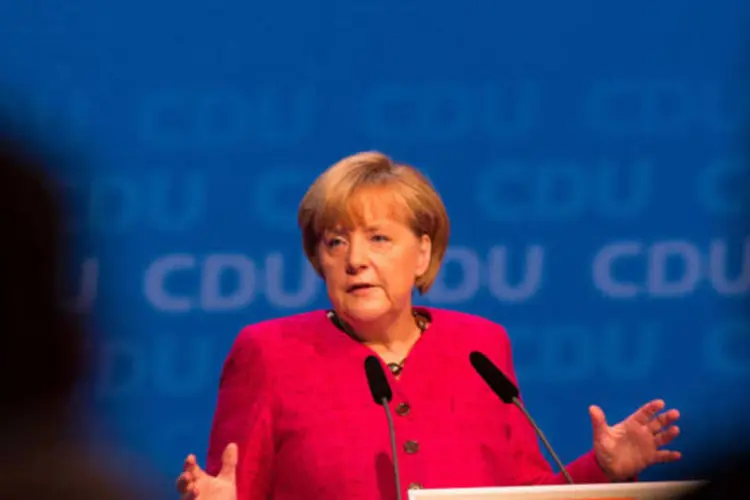 
	Angela Merkel, chanceler da Alemanha:&nbsp;No v&iacute;deo deste s&aacute;bado, ela falou ainda sobre o desafio que o envelhecimento populacional representa para a economia alem&atilde;
 (Krisztian Bocsi/Bloomberg)