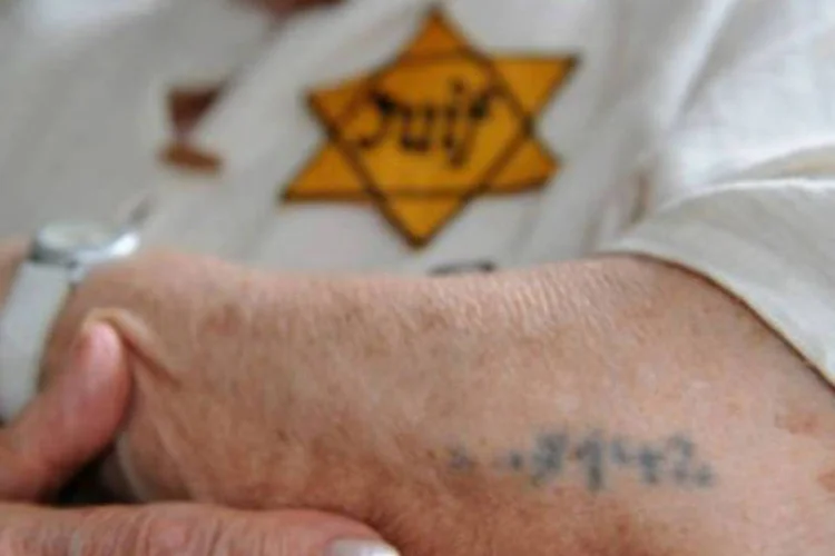 
	Sobrevivente do Holocausto: Brasil est&aacute; com nota ruim em relat&oacute;rio de esfor&ccedil;os de busca por criminosos nazistas
 (Mehdi Fedouach/AFP)