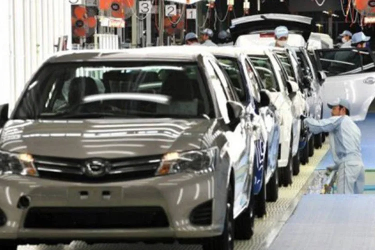 
	Trabalhadores da Toyota: o resultado mostra uma clara recupera&ccedil;&atilde;o de suas atividades ap&oacute;s um ano de 2011 marcado por um terremoto no Jap&atilde;o
 (Yoshikazu Tsuno/AFP)