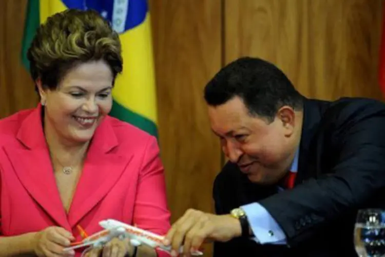 
	Ch&aacute;vez e Dilma em Bras&iacute;lia: a Celac, integrada por 33 pa&iacute;ses, foi criada em dezembro de 2011 em Caracas a pedido de Ch&aacute;vez
 (Pedro Ladeira/AFP)