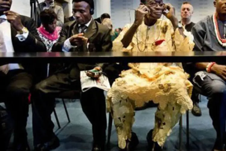Quatro fazendeiros nigerianos processam a Shell por crimes contra o meio-ambiente em Haia, 11 de outubro, 2012
 (Robin Utrecht/AFP)
