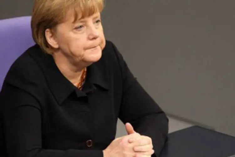 
	Merkel reconheceu que a economia alem&atilde; n&atilde;o ser&aacute; capaz de se isolar da recess&atilde;o no resto da Europa
 (Adam Berry/AFP)