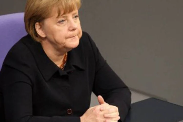 
	A maioria dos levantamentos dos &uacute;ltimos meses mostram Merkel e a oposi&ccedil;&atilde;o em uma corrida apertada com uma leve lideran&ccedil;a dos advers&aacute;rios da chanceler
 (Adam Berry/AFP)