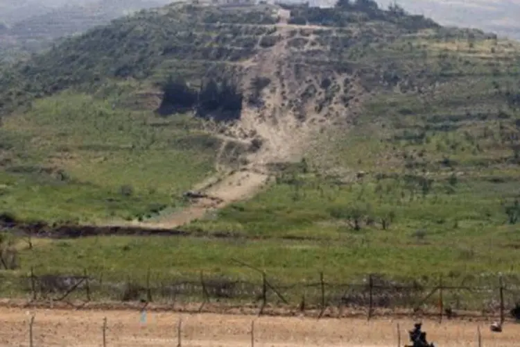 
	Soldados israelenses patrulham a fronteira da linha de cessar-fogo entre Israel e a S&iacute;ria
 (Jack Guez/AFP)