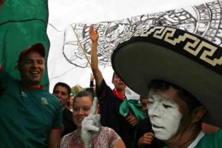 
	Torcedores celebram a medalha de ouro do futebol nos Jogos Ol&iacute;mpicos de Londres: o n&uacute;mero oficial da economia mexicana sair&aacute; em 18 de fevereiro
 (Hector Guerrero/AFP)