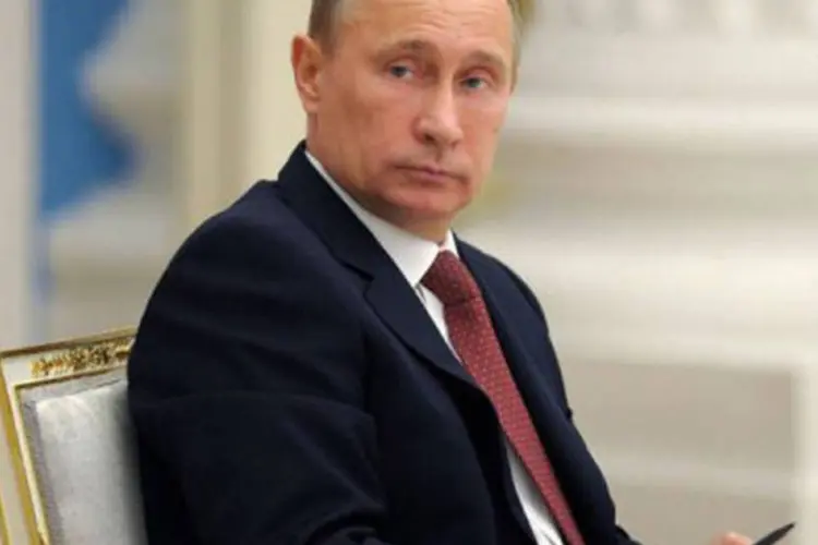 
	O presidente russo, Vladimir Putin, lidera uma reuni&atilde;o no Kremlin: governo e Parlamento de maioria governista aprovaram leis que imp&otilde;em restri&ccedil;&otilde;es &agrave; sociedade civil, concluiu a ONU
 (Alexey Druzhinin/AFP)