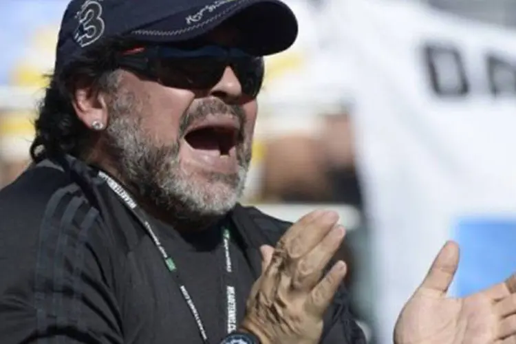
	O ex-jogador argentino Diego Maradona: &quot;eu jogava futebol e assinavam no meu lugar&quot;, declarou
 (Juan Mabromata/AFP)