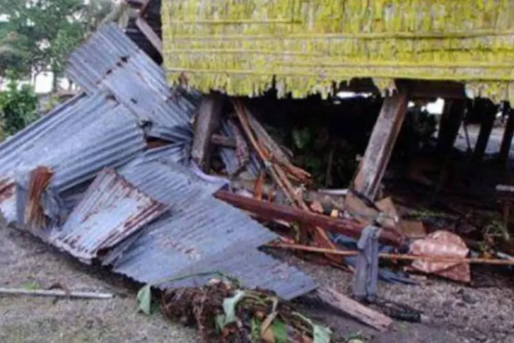 
	Danos ao vilarejo de Louva nas Ilhas Salom&atilde;o: treze pessoas morreram
 (World Vision/AFP)
