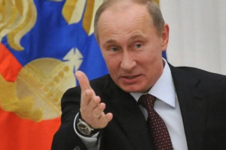 
	Vladimir Putin na reuni&atilde;o de G20: &quot;o principal desafio do G20 &eacute; saber se saber&aacute; mostrar-se eficaz para propor medidas de desenvolvimento em longo prazo&quot;, disse
 (Alexander Nemenov/AFP)