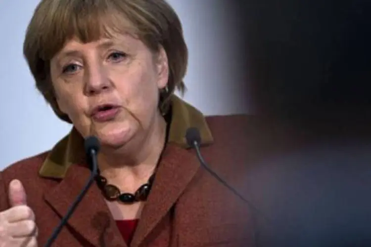 
	Chanceler alem&atilde; Angela Merkel em Berlim: ela assegurou que jamais esquecer&aacute;&nbsp;&quot;sua contribui&ccedil;&atilde;o &agrave; supera&ccedil;&atilde;o da divis&atilde;o da Europa e ao fim da Guerra Fria&quot;
 (John Macdougall/AFP)