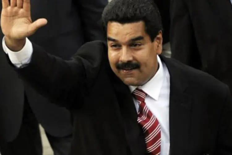 
	Nicol&aacute;s Maduro: presidente interino da Venezuela tem 49,2% das inte&ccedil;&otilde;es de voto, contra 34,8 % de Henrique Capriles.
 (Leo Ramirez/AFP)