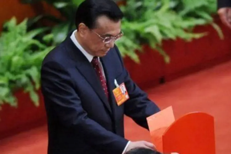 
	O novo primeiro-ministro da China, Li Keqiang: ele ter&aacute; a miss&atilde;o de reorientar a economia chinesa para um modelo mais voltado ao consumo interno do que para a exporta&ccedil;&atilde;o
 (Wang Zhao/AFP)