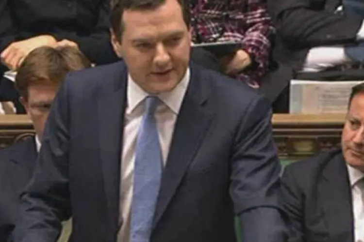 
	O ministro brit&acirc;nico das Finan&ccedil;as, George Osborne: ele explicou ante os deputados que cortou 12 bilh&otilde;es de libras em gastos sociais
 (AFP)