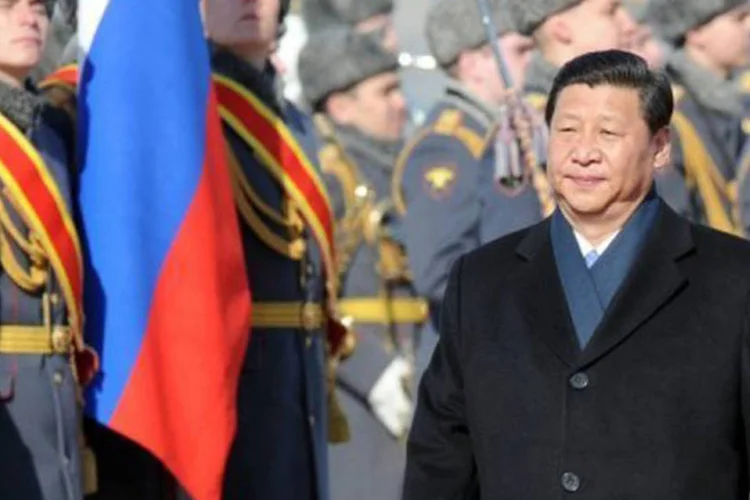 
	Xi Jinping chega a Moscou: &quot;atualmente, as rela&ccedil;&otilde;es entre R&uacute;ssia e China est&atilde;o em pleno apogeu, passam pelo melhor per&iacute;odo de sua hist&oacute;ria secular&quot;, declarou
 (Alexander Nemenov/AFP)