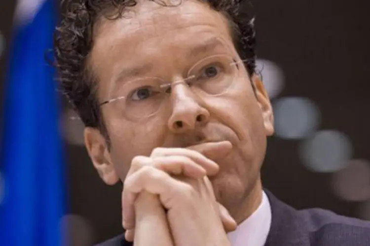 
	O presidente do Eurogrupo, Jeroen Dijsselbloem: &quot;ainda n&atilde;o chegamos l&aacute;, ainda h&aacute; muito trabalho a ser feito&quot;
 (John Thys/AFP)