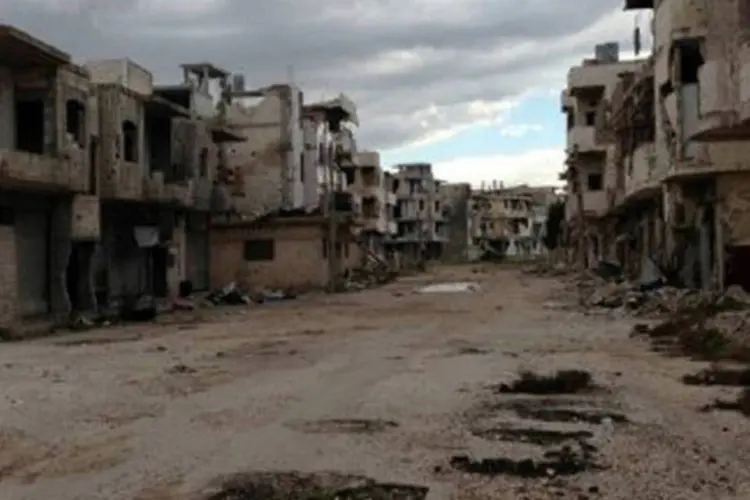 
	Bairro de Baba Amr, em Homs, na S&iacute;ria, destru&iacute;do e deserto ap&oacute;s confrontos: pelo menos 70 mil pessoas morreram nos dois anos de conflito na S&iacute;ria
 (Sarkis Kassarjian/AFP)