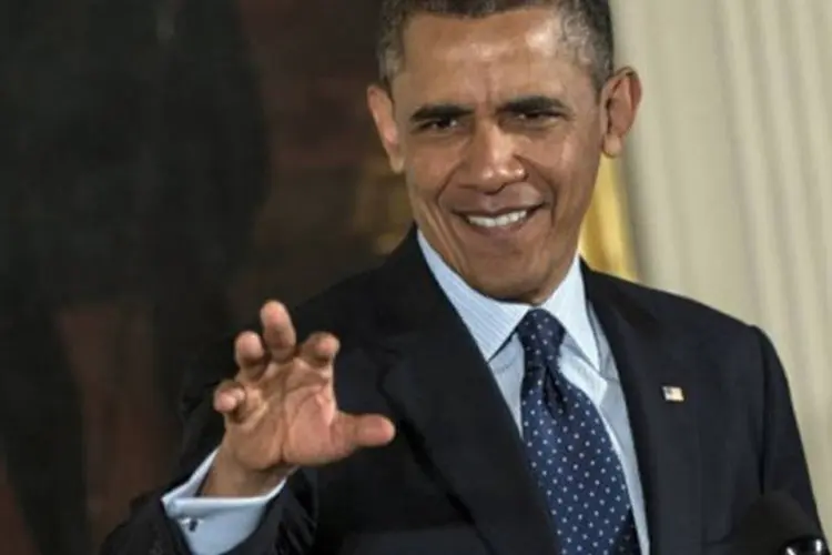 
	Obama: o l&iacute;der americano elogiou os esfor&ccedil;os tanto dos republicanos como os dos democratas para levar a proposta da reforma migrat&oacute;ria adiante
 (Brendan Smialowski/AFP)