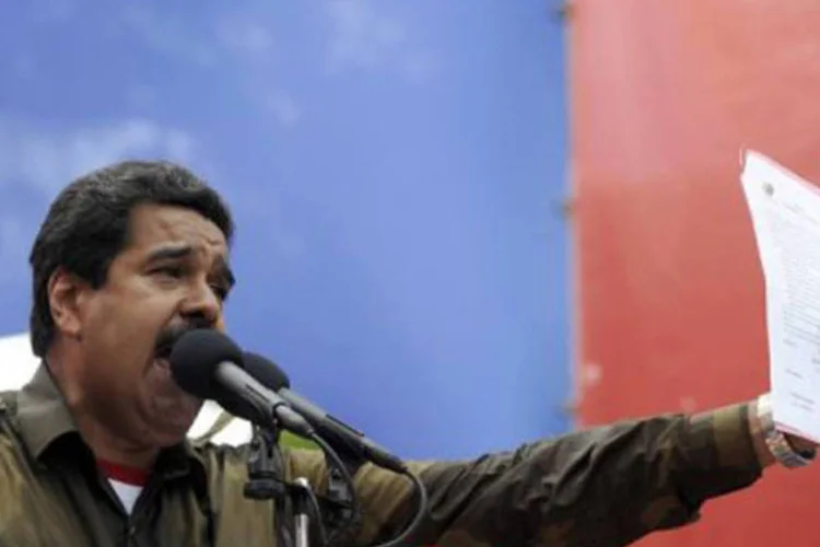 
	Nicolas Maduro:&nbsp;a proclama&ccedil;&atilde;o de Maduro no CNE ser&aacute; realizada embora Capriles e um setor pr&oacute;ximo &agrave; oposi&ccedil;&atilde;o tenham pedido a recontagem de 100% dos votos depois de n&atilde;o reconhecerem os resultados&nbsp;.
 (Juan Barreto/AFP)