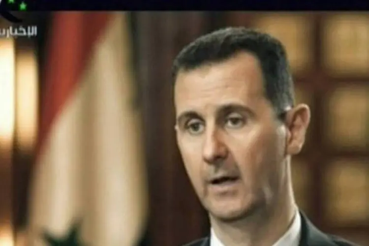 
	Bashar al-Assad: &quot;a entrevista revelou que est&aacute; isolado da realidade e cego diante da corrup&ccedil;&atilde;o, devasta&ccedil;&atilde;o e do banho do sangue que provocou&quot;, indicou a oposi&ccedil;&atilde;o
 (AFP)
