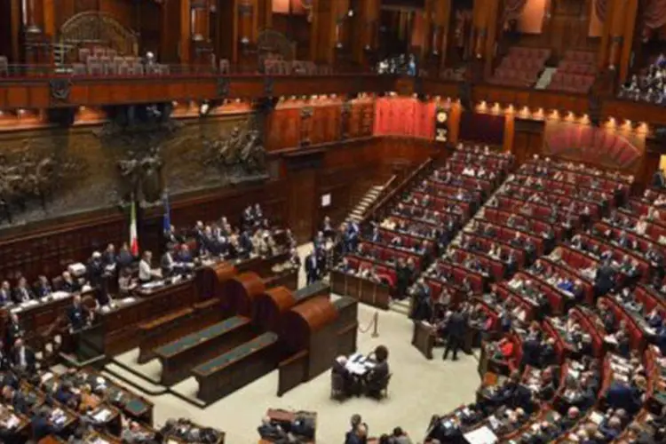 
	Parlamento italiano em vota&ccedil;&atilde;o: a rodada terminou sem um vencedor, como estava previsto, devido ao desacordo que reina entre os partidos
 (Alberto Pizzoli/AFP)