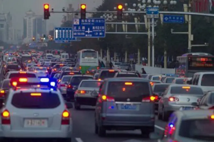 
	Carros circulam perto da Pra&ccedil;a da Paz Celestial em Pequim: pesquisa&nbsp;estima que o n&uacute;mero de trailers na China subir&aacute; de cerca de 9.000 para 800.000 nos 10 anos at&eacute; 2022
 (Ed Jones/AFP)