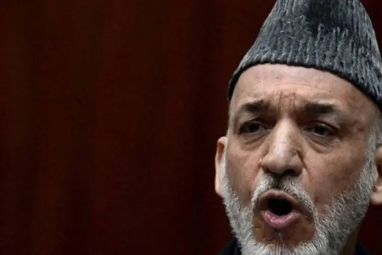 
	Hamid Karzai: presidente afeg&atilde;o exige o fim de todas as opera&ccedil;&otilde;es militares unilaterais dos EUA em territ&oacute;rio afeg&atilde;o, entre outras coisas, para assinar o pacto
 (Shah Marai/AFP)