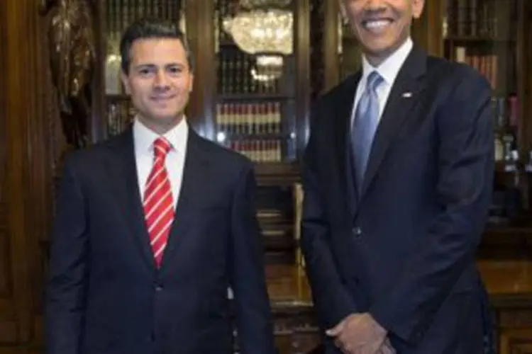 
	Barack Obama (D) e o presidente do M&eacute;xico, Enrique Pe&ntilde;a Nieto: &quot;quando o M&eacute;xico vai bem, os Estados Unidos v&atilde;o bem, e tamb&eacute;m o contr&aacute;rio&quot;, disse o americano
 (AFP)