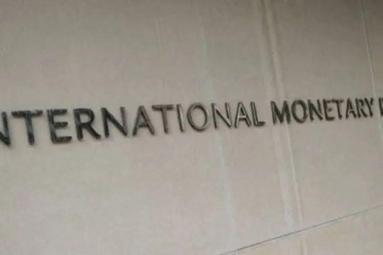 
	Sede do FMI: economia americana acelerou e conseguiu se recuperar, disse o FMI
 (Mandel Ngan/AFP)