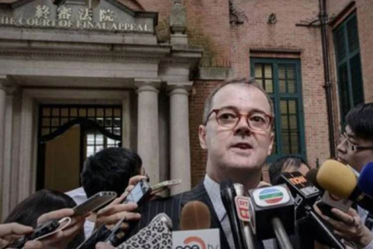 
	Michael Vidler, advogado da transexual W: &quot;com este caso, as minorias sexuais s&atilde;o reconhecidas e seus direitos s&atilde;o considerados t&atilde;o importantes quanto os dos demais&quot;, disse
 (Philippe Lopez/AFP)