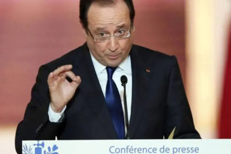 
	Fran&ccedil;ois Hollande: o presidente franc&ecirc;s disse em entrevista ao jornal Le Monde que ainda defende uma a&ccedil;&atilde;o punitiva &quot;firme&quot; em resposta ao ataque qu&iacute;mico
 (Patrick Kovarik/AFP)