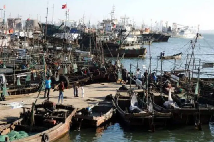 
	Localidade pesqueira de Dalian, no noroeste do pa&iacute;s: o caso dos pescadores abalava a rela&ccedil;&atilde;o entre Pequim e Pyongyang
 (AFP)