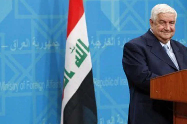 
	O chanceler s&iacute;rio, Walid Muallem: ele&nbsp;confirmou no domingo a participa&ccedil;&atilde;o do governo de Assad na confer&ecirc;ncia de Genebra
 (Thaier Al Sudani/AFP)