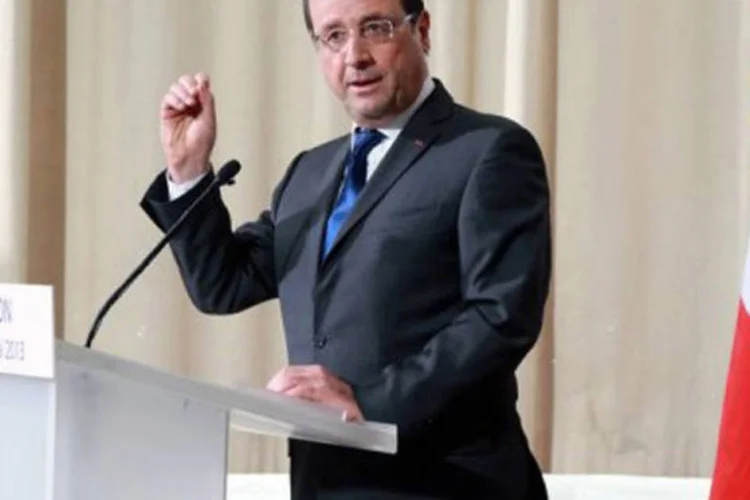 
	Fran&ccedil;ois Hollande: &quot;a Fran&ccedil;a est&aacute; pronta para punir quem tomou a decis&atilde;o de atacar inocentes com g&aacute;s&quot;
 (Pierre Verdy/AFP)