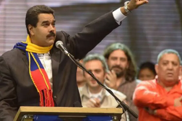 
	O presidente venezuelano afirmou ainda que seu pa&iacute;s continuar&aacute; apoiando o processo de paz entre o governo da Col&ocirc;mbia e as For&ccedil;as Armadas Revolucion&aacute;rias da Col&ocirc;mbia (Farc)
 (Juan Mabromata/AFP)