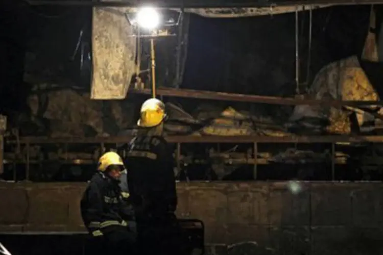 O incêndio aconteceu no abatedouro de Baoyuanfeng quando pelo menos 300 pessoas trabalhavam no local
 (AFP)
