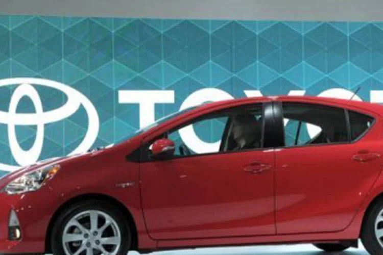 
	Carro da Toyota: neste ano, o grupo japon&ecirc;s espera vender 340 mil unidades a mais, batendo recorde no setor
 (Stan Honda/AFP)