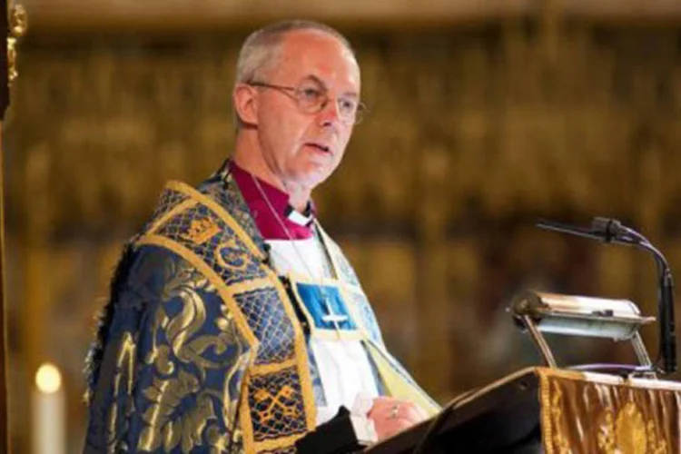 
	O chefe da Igreja Anglicana, Justin Welby: primeira mulher bispo pode ser investida no fim do ano
 (Jack Hill/AFP)
