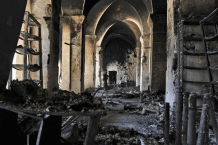 Mesquita Umayyad queimada, na Cidade Antiga de Alepo: este e outros cinco locais sírios foram incluídos na lista do Patrimônio da Humanidade da Unesco em perigo devido guerra civil (Tauseef Mustafa/AFP)