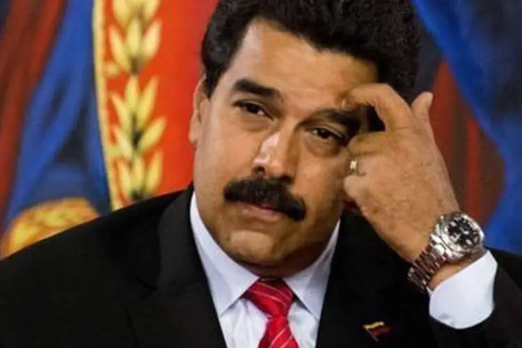 
	Maduro, presidente da Venezuela: o PIB do pa&iacute;s retrocedeu 3,9%, em 2014, e 5,7%, em 2015
 (AFP)