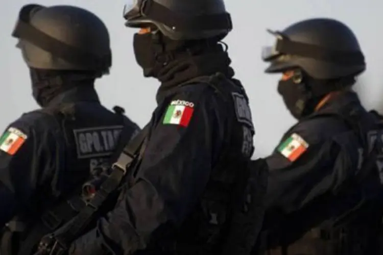 
	Pol&iacute;cia federal mexicana: o titular da Divis&atilde;o Antidrogas afirmou que relat&oacute;rios de intelig&ecirc;ncia assinalam que este sujeito formou um grupo delitivo que alcan&ccedil;ou presen&ccedil;a em oito estados
 (Yuri Cortéz/AFP)