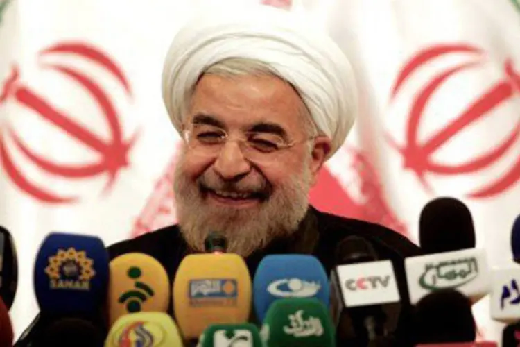 O presidente eleito do Irã, Hassan Rohani, durante coletiva de imprensa: "quem são os sionistas para nos ameaçar?", questionou (Behrouz Mehri/AFP)