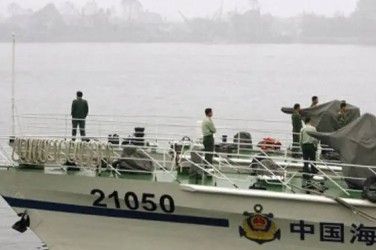 
	Barco da guarda costeira chinesa faz uma patrulha em rio: conflito por arquip&eacute;lago teve impacto negativo nas rela&ccedil;&otilde;es bilaterais entre China e Jap&atilde;o, que atualmente se encontram em seu pior n&iacute;vel
 (Liu Jin/AFP)
