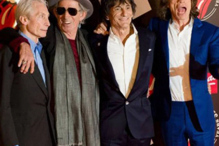 Integrantes dos Rolling Stones: assim como Mick Jagger, que completa 70 anos na sexta-feira, vários músicos que começaram carreira na mesma época continuam presentes no cenário musical, se misturando a outros que têm idade para serem seus netos (Leon Neal/AFP)