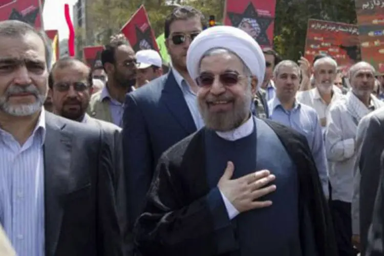 Rohani participa de uma passeata para marcar o Dia Internacional de Al-Quds, em Teerã: está previsto que seu governo seja formado principalmente por tecnocratas experientes (Atta Kenare/AFP)