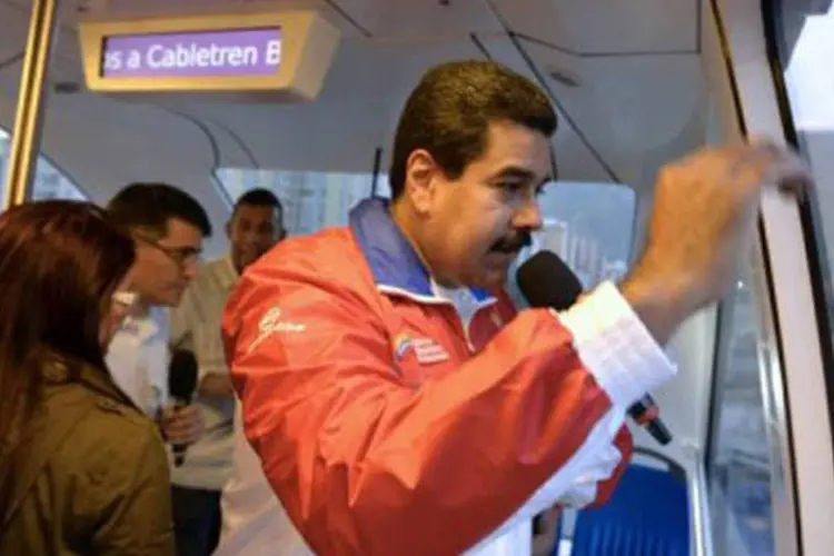 
	Presidente da Venezuela, Nicolas Maduro: no in&iacute;cio de maio, Maduro acusou Uribe de ser um&nbsp;&quot;assassino&quot;&nbsp;e coordenar um plano para mat&aacute;-lo, e denunciou que paramilitares estavam tentando entrar em seu pa&iacute;s com para isso
 (Juan Barreto/AFP)