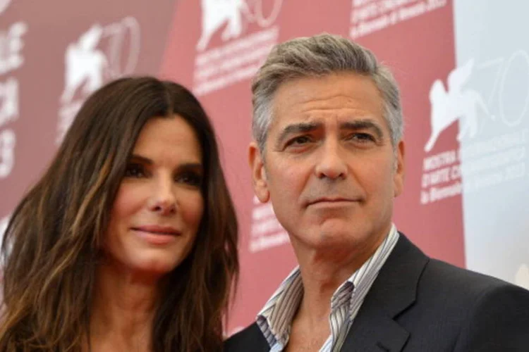Sandra Bullock e George Clooney: no filme que abre festival, atores interpretam um casal de astronautas que ficam à deriva no espaço após acidente espacial (Getty Images)
