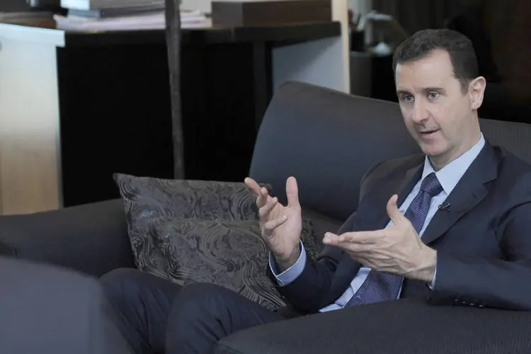 Presidente da Síria, Bashar al-Assad: "ameaças de um ataque direto aumentarão a defesa de nossos princípios", disse (SANA/Distribuído via Reuters)