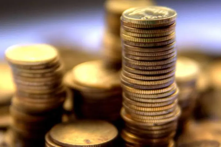 Pilha de moedas: Aposta mínima da Lotofácil custa 1,50 real (Stock.xchng)