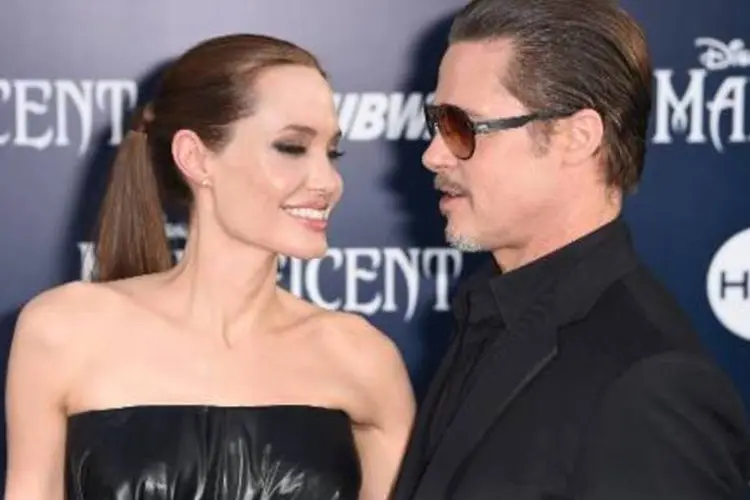
	Brad Pitt e Angelina Jolie: drama rom&acirc;ntico &eacute; escrito e dirigido pela pr&oacute;pria Angelina
 (Robyn Beck/AFP)